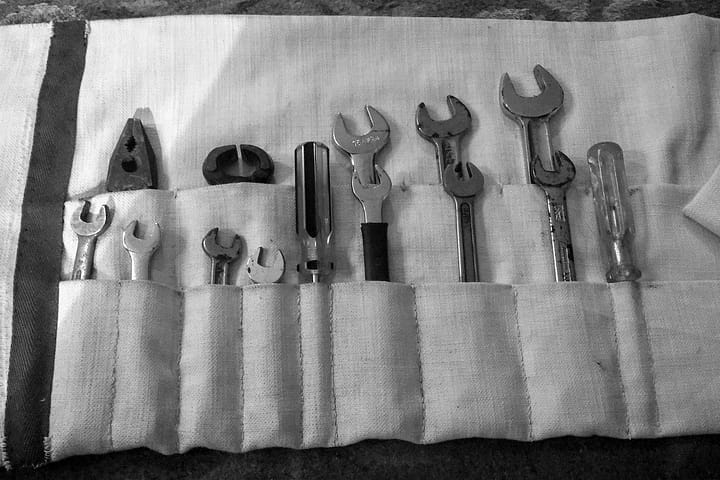 Picture of spanners and other tools in a tool roll - illustrating a blog post on website content audit